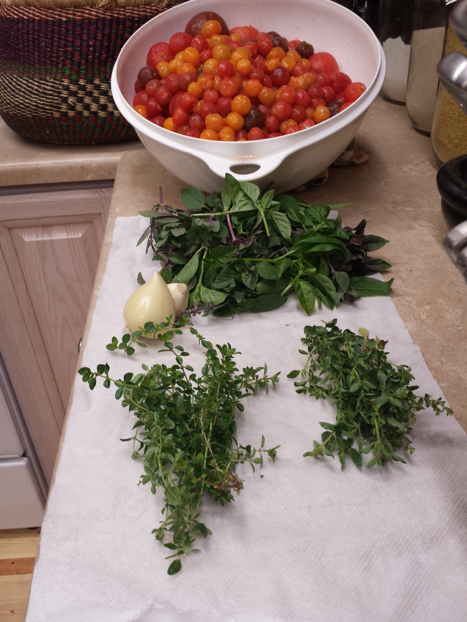 Tomatoes peeled and herbs gathered.